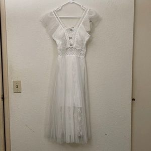 Plated White lace dress.  Lined.  3 layes